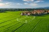 Foto: Feld mit aufgezeichneten Grundstück